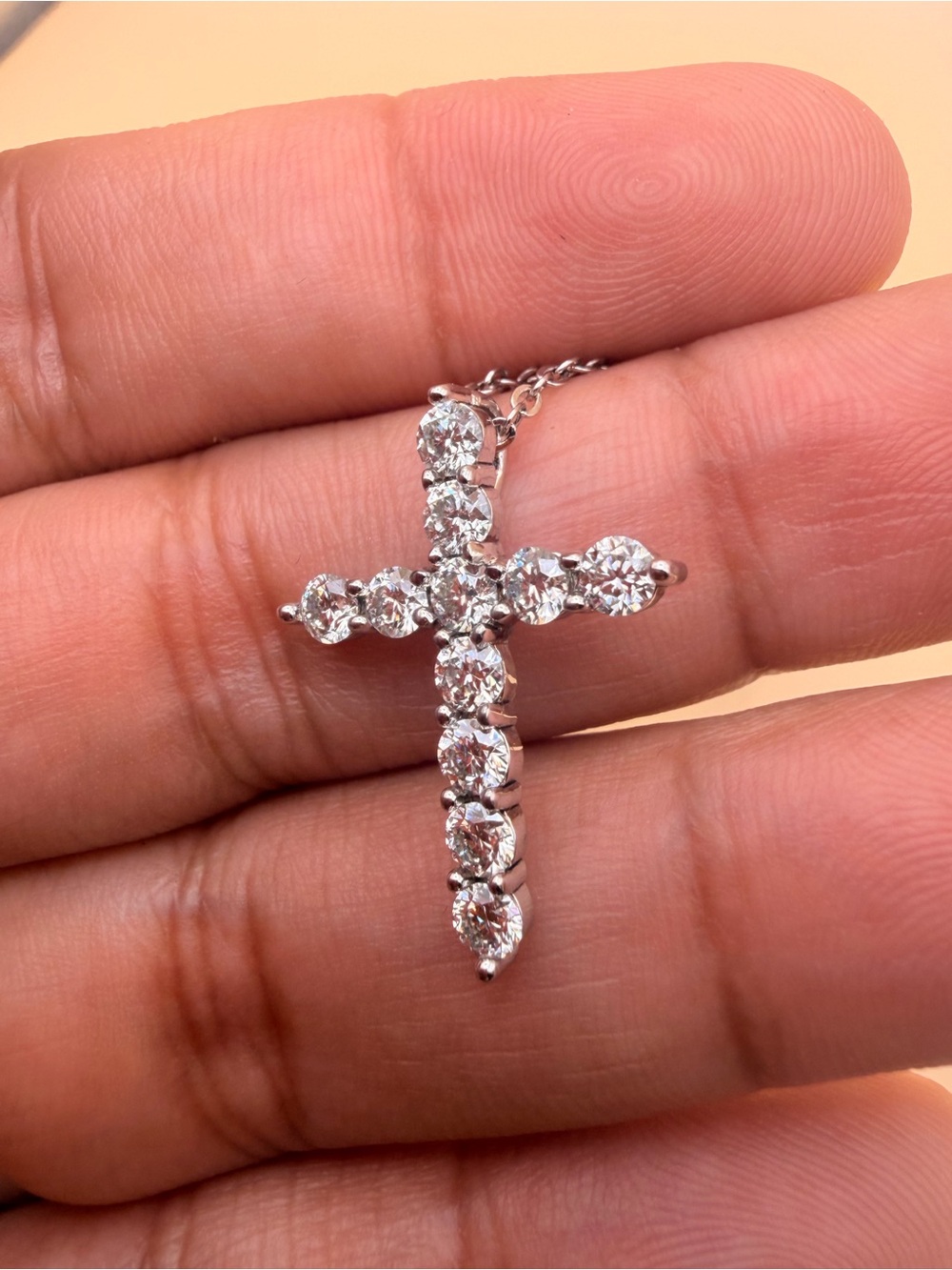 925 Sterling Silver 1 Ctw Moissanite Cross Pendant & 15.5 to 17.25” Chain.